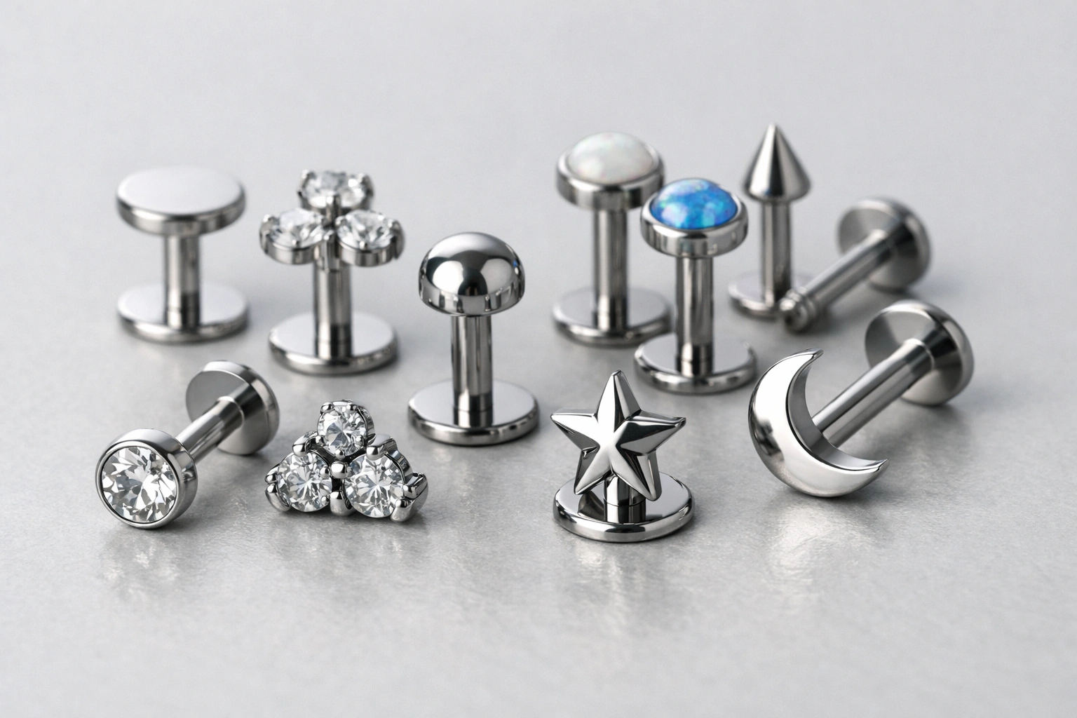 ASTM F136 titanium labret jewelry collection with multiple gauges and systems