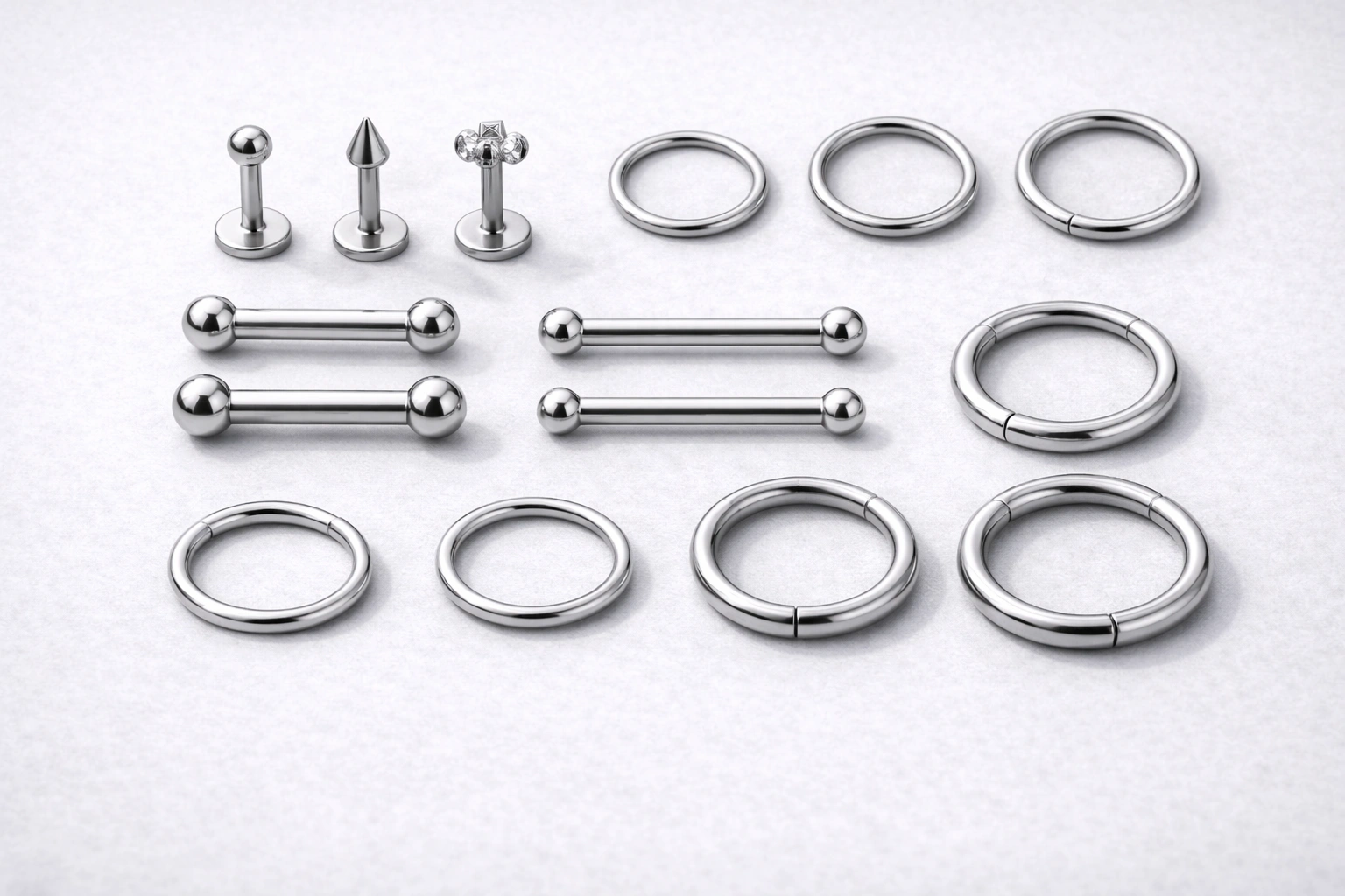 Titanium piercing jewelry SKU set flat lay