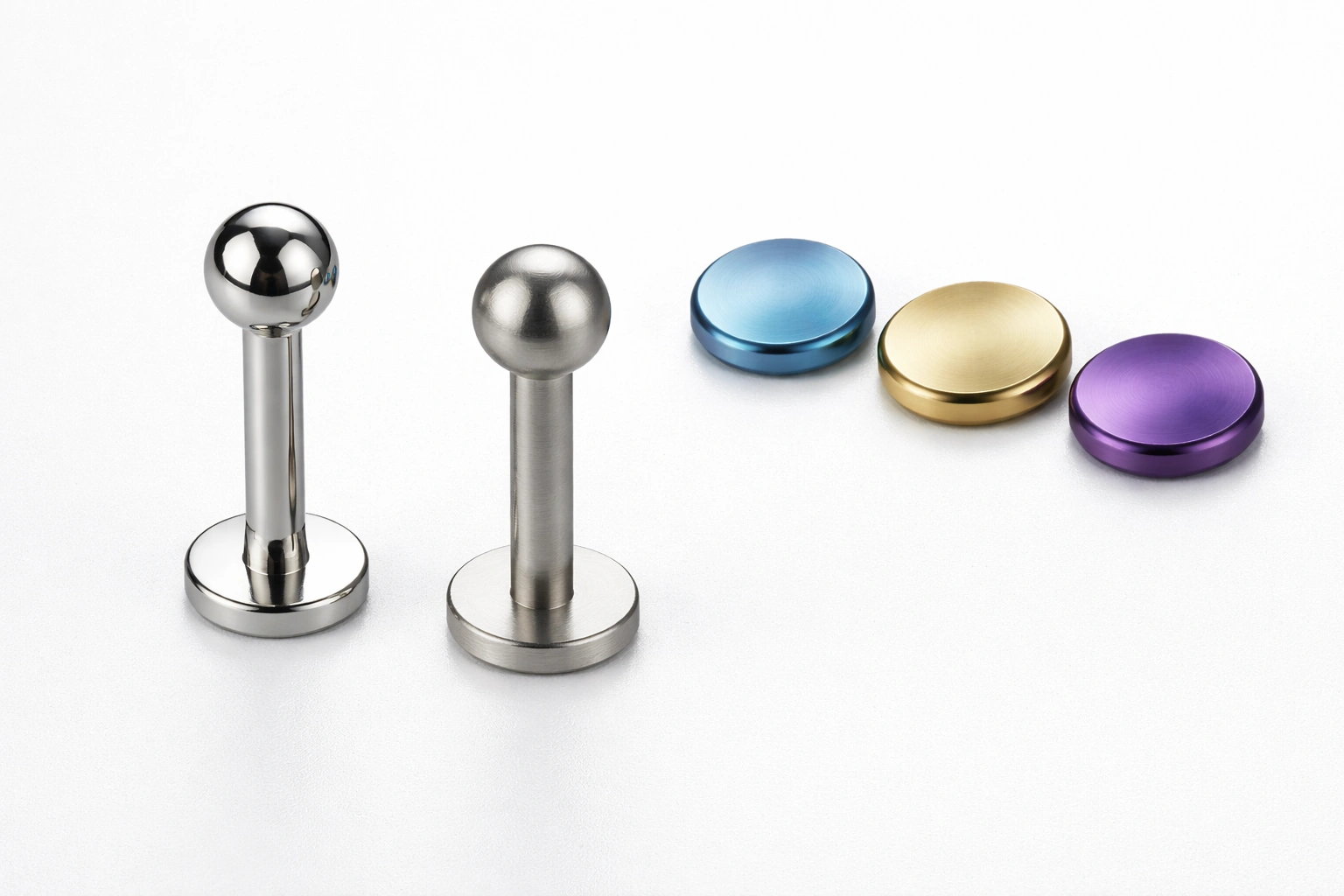 Titanium jewelry surface finish and anodized color samples