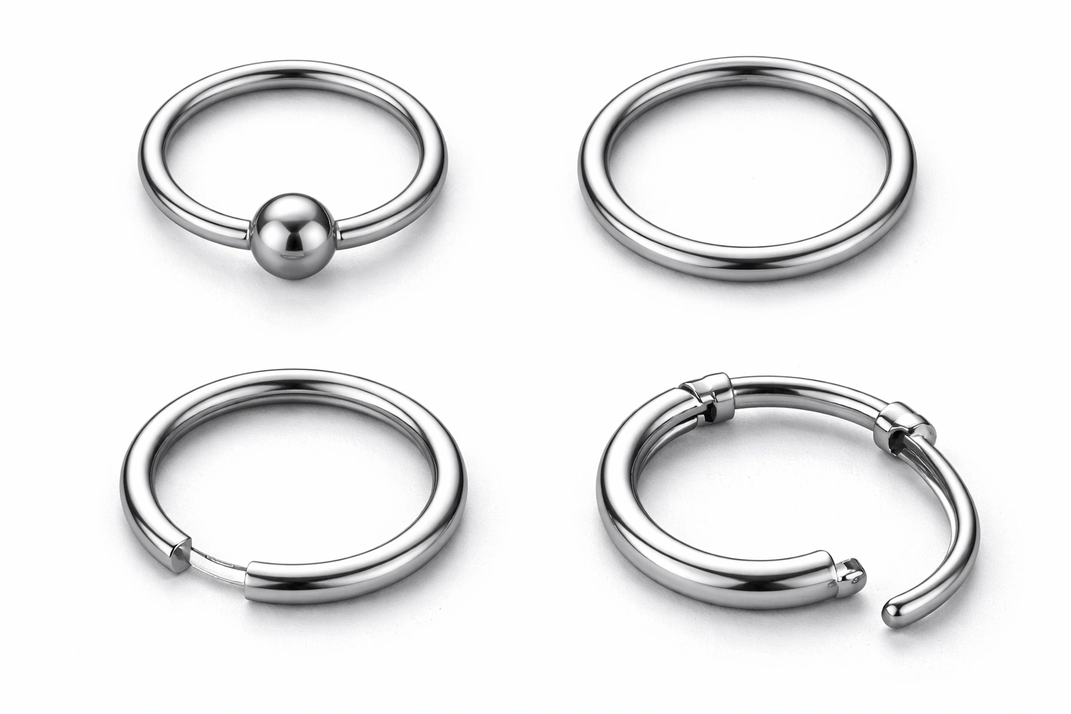 Flat lay comparison of titanium ring types captive bead ring segment ring seamless ring and clicker ring