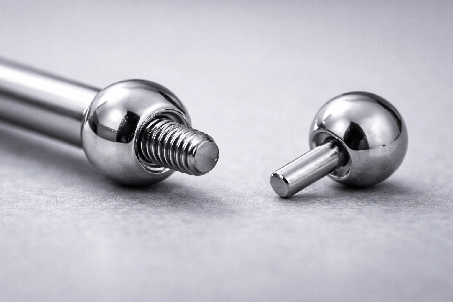 Macro detail of titanium barbell threading system